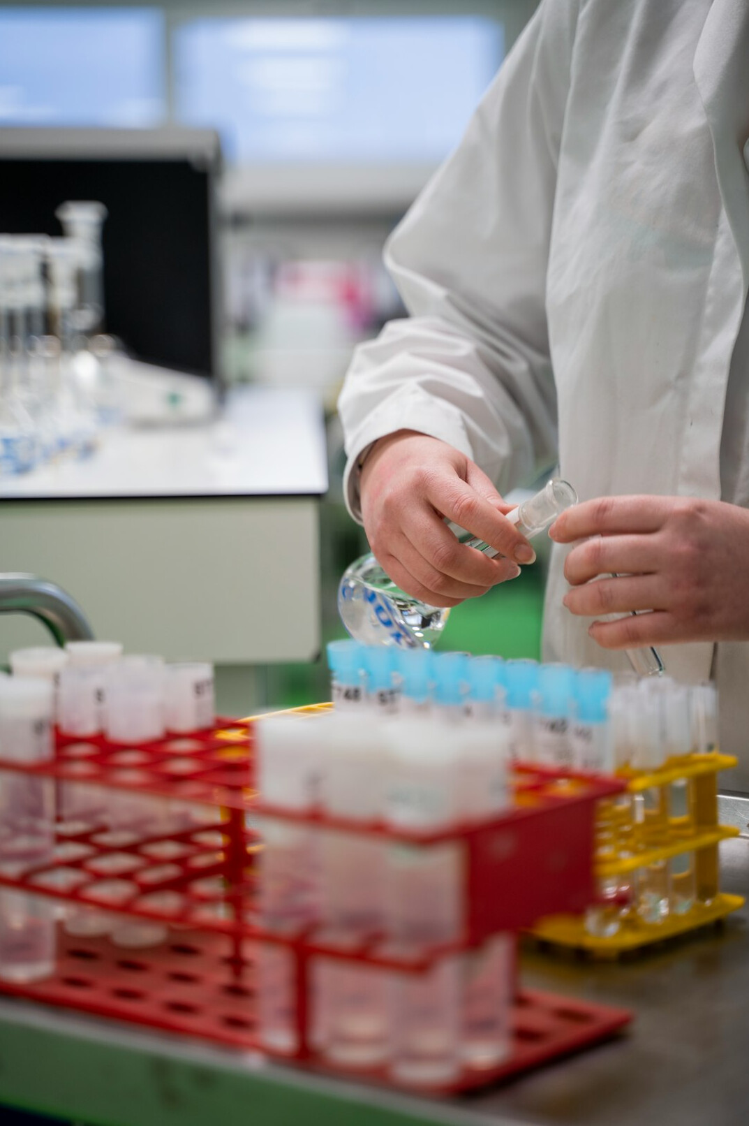 scientist examining evidence in lab