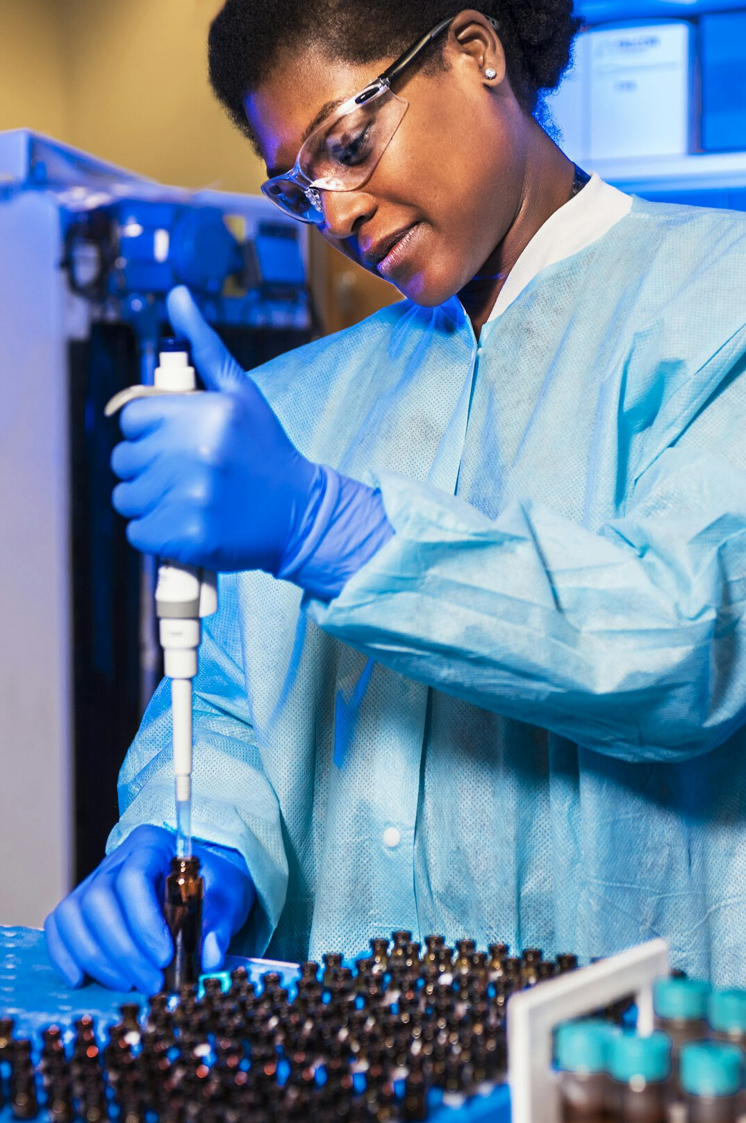 scientist examining evidence in lab