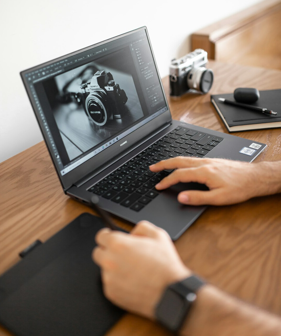 person editing photo on computer